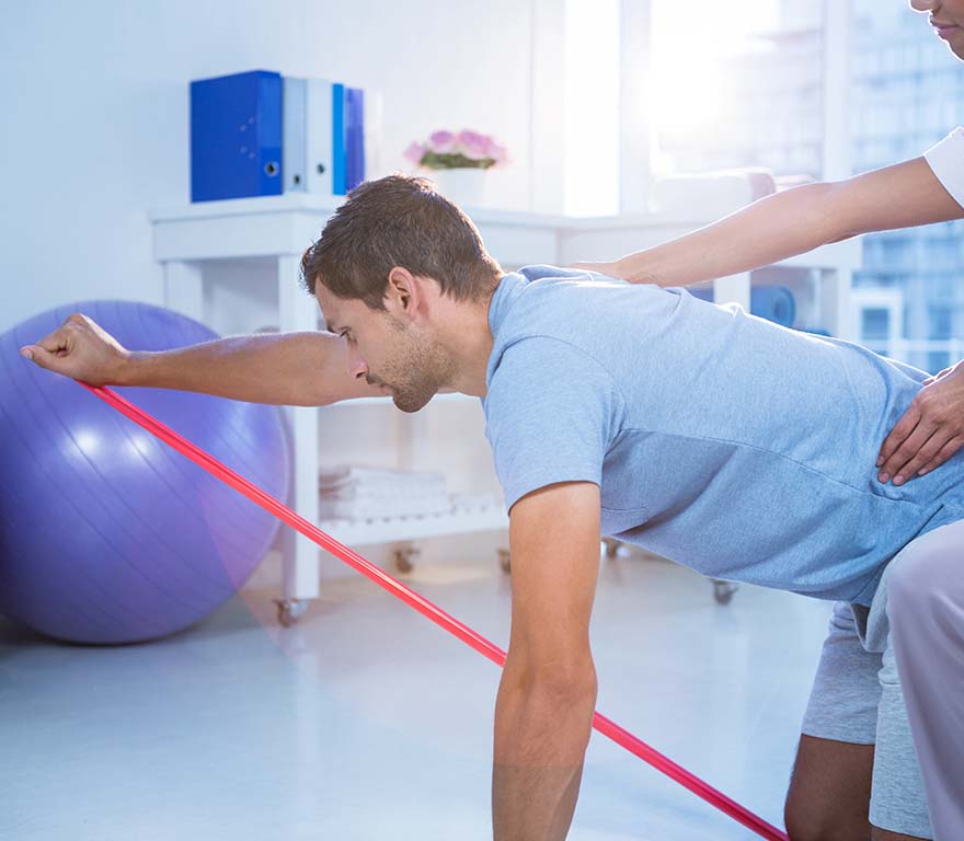 Patient receiving corrective exercise for low back pain